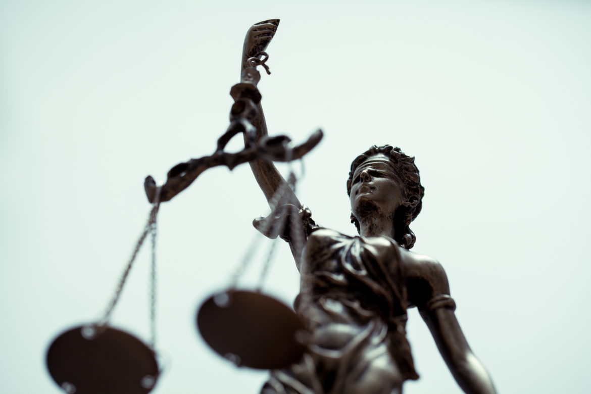 A scales of justice at an LA courthouse